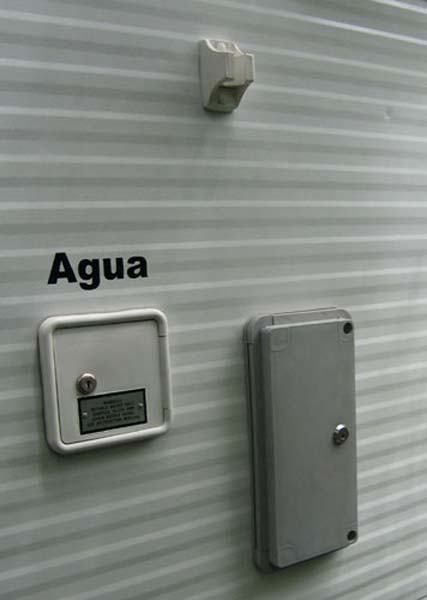 Water filler and service hatch