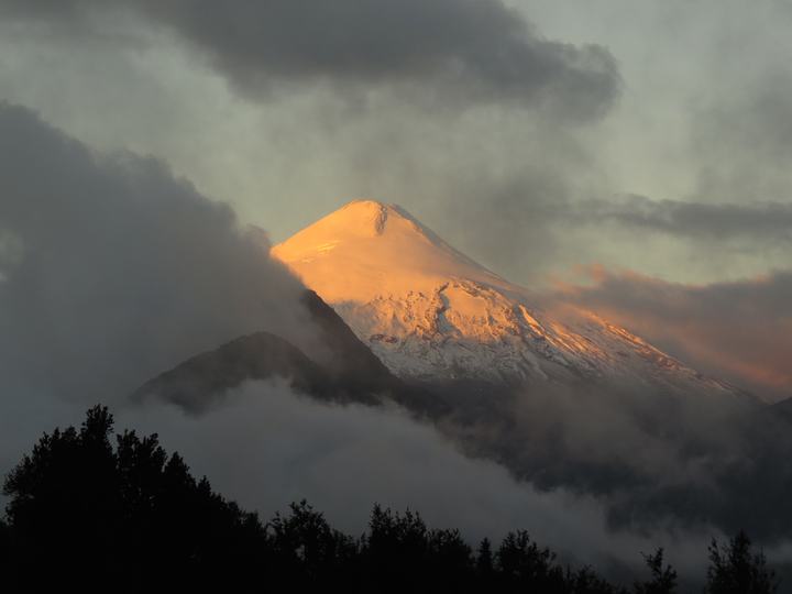 The volcano in evening clouds