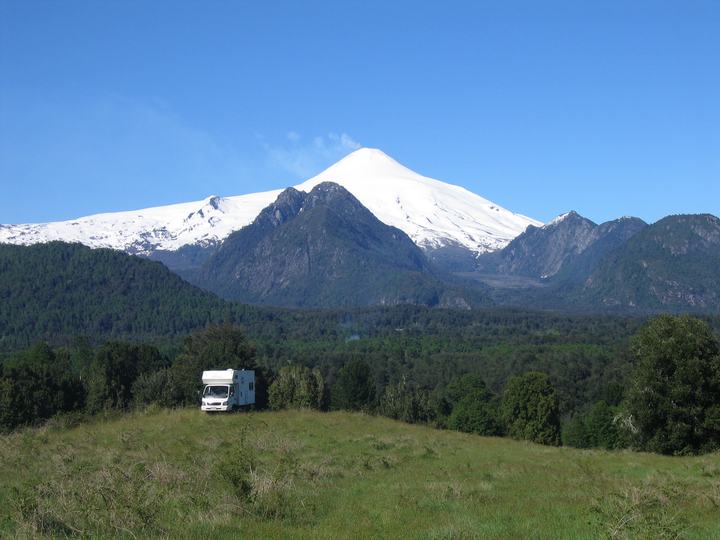 Camper in the meadow, Villarrica behind